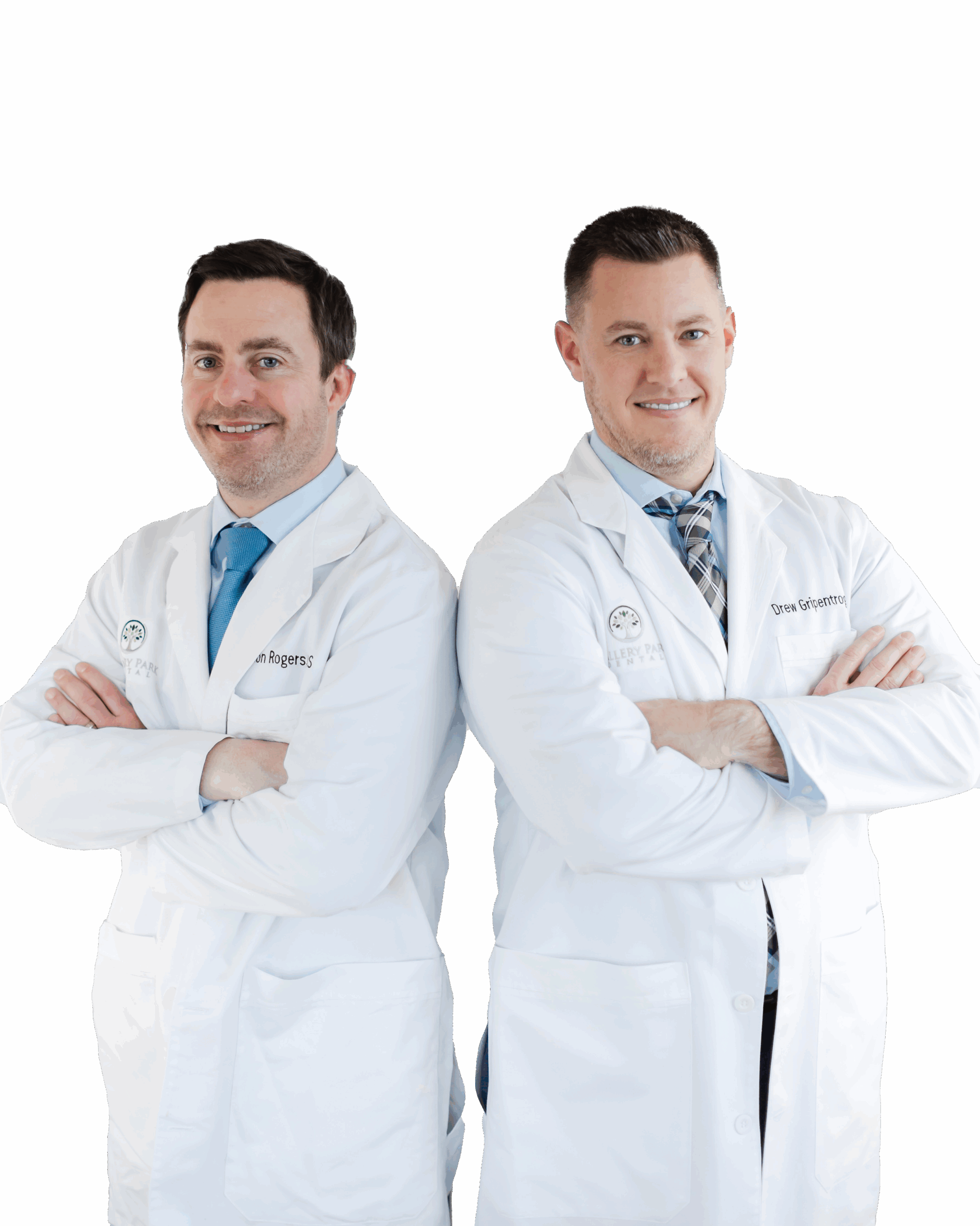 Dr. Rogers & Dr. Gripentrog Dr. Rogers & Dr. Gripentrog standing back to back in white doctor coats
